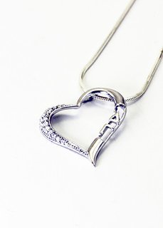 Sterling silver heart pendant set with lab-created diamonds