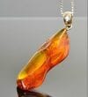 Amber Amulet Made of Natural Shape Cognac Color Amber Rock