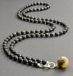 Amber Pendant Necklace Adorned with Sterling Silver Spacers