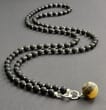 Amber Pendant Necklace Adorned with Sterling Silver Spacers