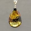 "Earth Stone" Amber Pendant Made of Light Greenish Baltic Amber