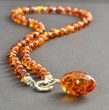 Amber Pendant Necklace Adorned with Sterling Silver Spacers