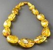 Amber Necklace Made of Golden Large Olive Amber Beads
