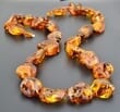 Large Amber Necklace Made of Natural Shape Cognac Color Amber Rocks