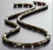Mens Amber Necklace Made of Tube Shaped Dark Cherry Color Amber