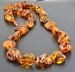 Large Amber Necklace Made of Natural Shape Cognac Color Amber Rocks