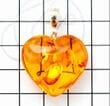 Dainty Amber Heart Pendant Made of Light Cognac Color Amber