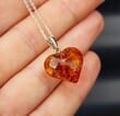 Dainty Amber Heart Pendant Made of Cognac Color Amber