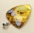 Triangle Shape Amber Pendant Made of Precious Baltic Amber
