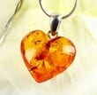 Dainty Amber Heart Pendant Made of Light Cognac Color Amber