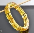 Bangle Style Amber Bracelet Made of Golden Color Amber