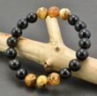 Men's Beaded Bracelet Made of Black and Marble Baltic Amber