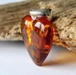 Small Amber Heart Pendant Made of Dark Cognac Baltic Amber