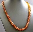 SPARKLING Amber Necklace Made of Faceted Cognac Color Amber
