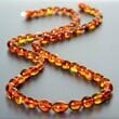 Amber Healing Necklace Made of Bean Shape Cognac Color Amber