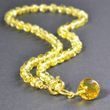 Golden Amber Pendant Necklace Adorned with Gold Plated Silver