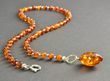 Amber Pendant Necklace Adorned with Sterling Silver Spacers