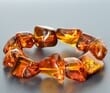 Large Amber Bracelet Made of Natural Shape Cognac Color Amber Rocks