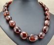 Massive Cherry Amber Necklace Made of Large Oval Amber Beads