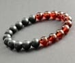 Mens Beaded Bracelet Made of Matte Black and Light Cherry Amber