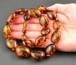 Large Amber Necklace Made of Oval Cognac Color Amber 