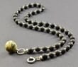 Amber Pendant Necklace Adorned with Sterling Silver Spacers