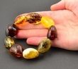 Amber Bracelet Made of Larger Olive Shape Baltic Amber Beads