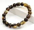 Mens Amber Bracelet Made of Dark and Light Green Amber