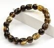 Mens Beaded Bracelet Made of Dark and Light Green Amber