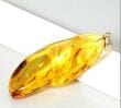 Amber Amulet Made of Tall Natural Shape Honey Color Amber Rock