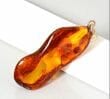 Amber Amulet Made of Natural Shape Cognac Color Amber Rock