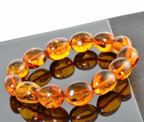 Amber Bracelet Made of Cognac Color Oval Amber Beads