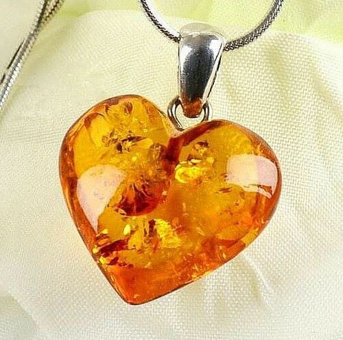 Dainty Amber Heart Pendant Made of Light Cognac Color Amber