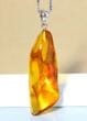 Amber Amulet Made of Natural Shape Honey Color Amber Rock