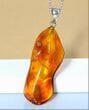Amber Amulet Made of Natural Shape Cognac Color Amber Rock