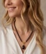 Dark Cherry Amber Pendant Necklace Adorned with Gold Plated Silver