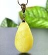  Amber Pendant Made of Carved Butterscotch Color Amber