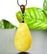  Amber Pendant Made of Carved Butterscotch Color Amber