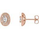 Genuine Sapphire Earrings in 14 Karat Rose Gold Sapphire & 1/8 Carat Diamond Halo-Style Earrings