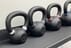 9-Piece Commercial Grade Cast Iron Kettlebell Set with Storage Rack